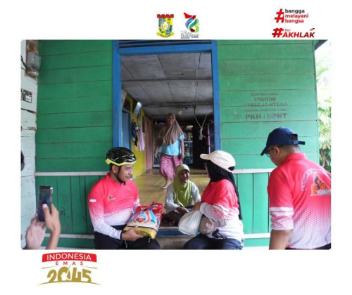 Bupati Kampar Pimpin Penyaluran Sembako untuk Warga Kurang Mampu